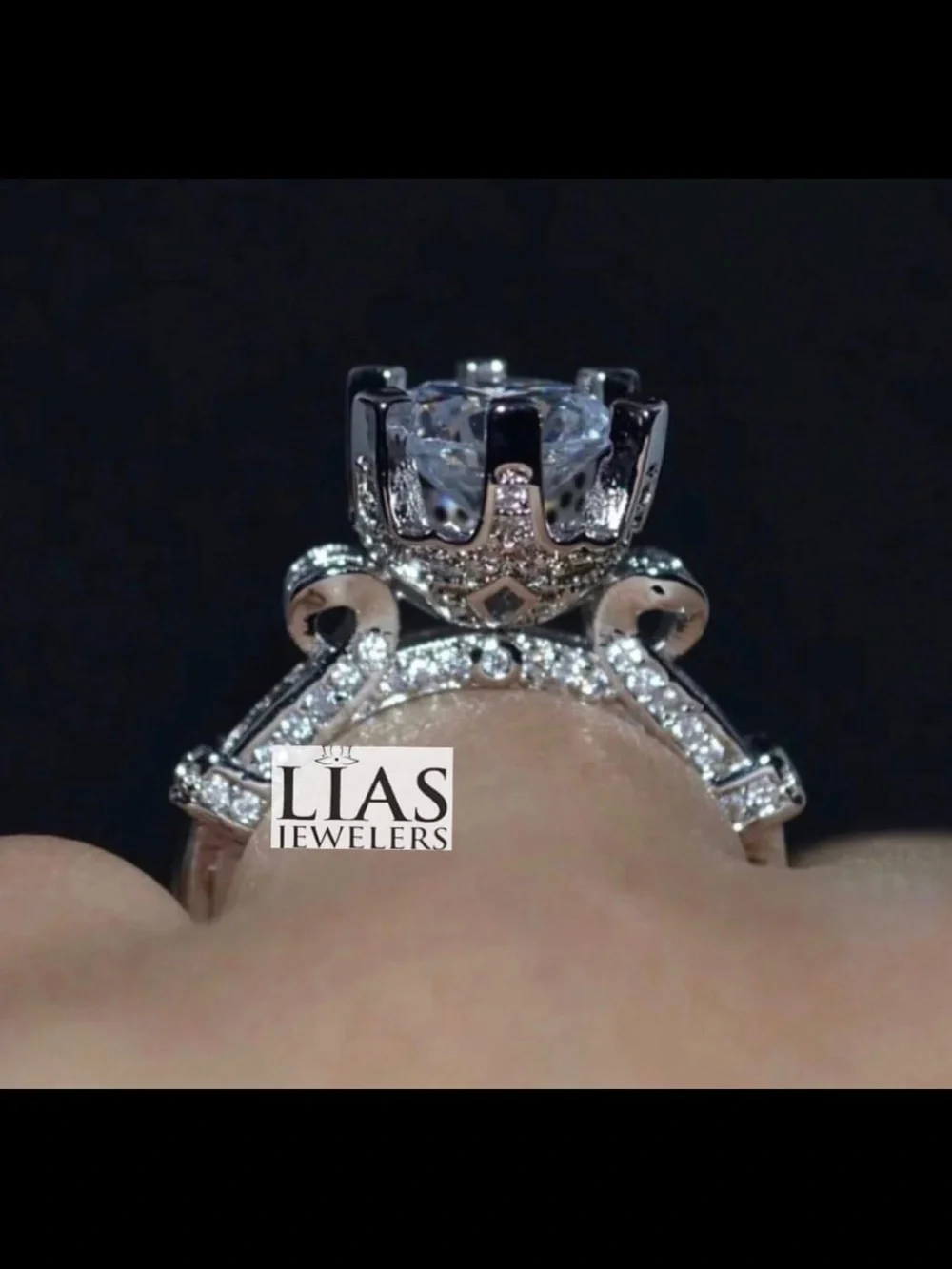 New 18k white gold engagement ring